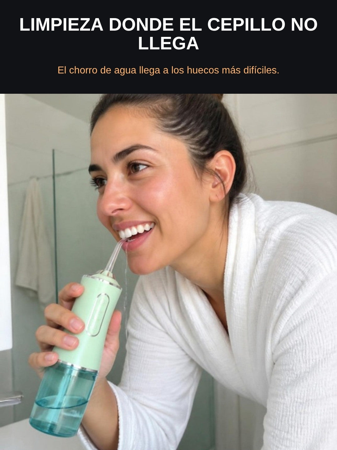 Mujer usando el irrigador: limpieza donde el cepillo no llega